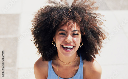 Black woman, happy in portrait with fashion and beauty outdoor, street style with natural hair, makeup and jewelry. Freedom, happiness and mockup with afro, person in Cape Town with mindset and glow
