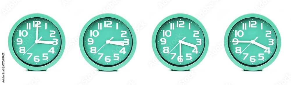 close up of a set of green clocks showing the time; 3, 3.15, 3.30 and 3.45 p.m or a.m. Isolated on white background - obrazy, fototapety, plakaty 