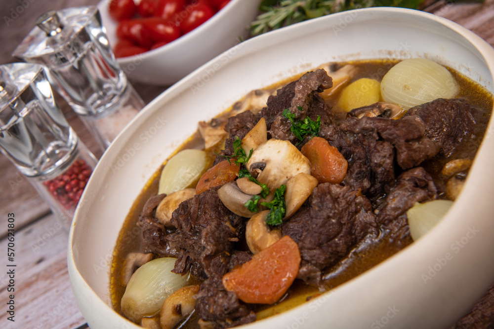 Beef bourguignon recipe, beef stew with wine sauce and vegetables. High quality photo Beef bourguignon recipe, beef stew with wine sauce and vegetables. High quality photo