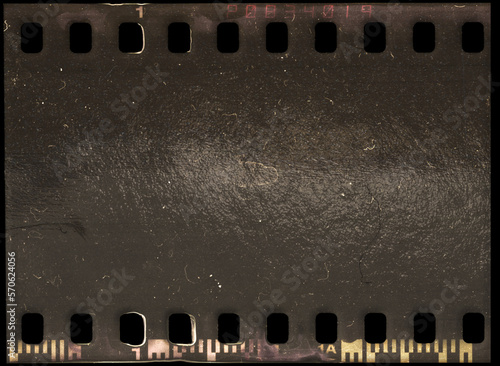single part of empty or blank 35 mm film strip on black background. negative photo snip isolated.