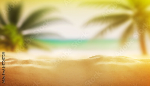 Close up of sand with blurred sea background.