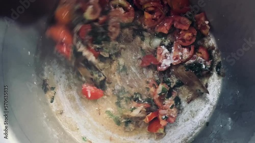 Preparing delicious indian style biryani