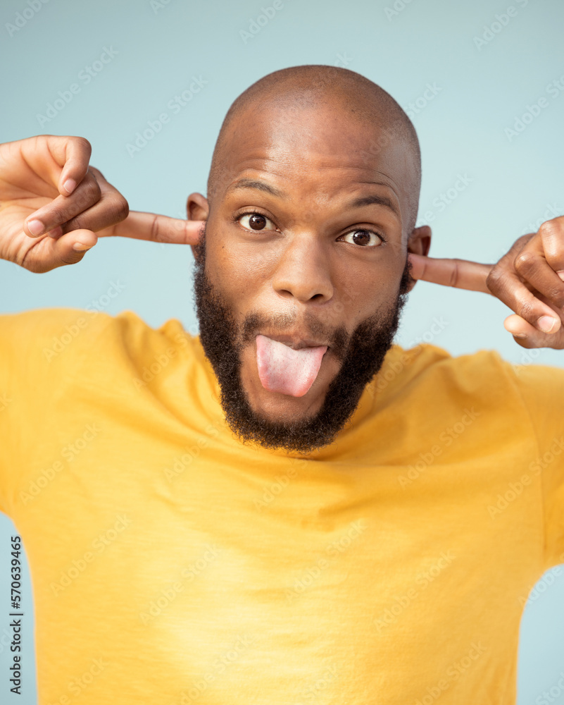 comic-playful-and-portrait-of-a-black-man-with-a-funny-face-isolated