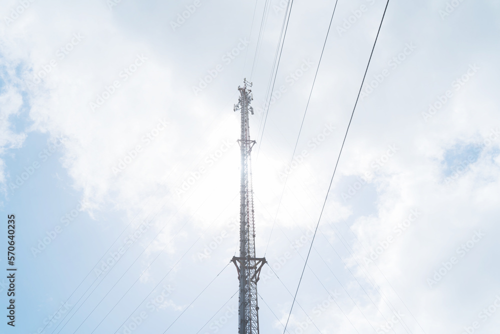 Telecommunication mast TV antennas in the afternoon ,on the hill blue sky with cloud bright at Phuket Thailand. Telecommunication mast TV antennas in the afternoon ,on the hill blue sky with cloud bright at Phuket Thailand.