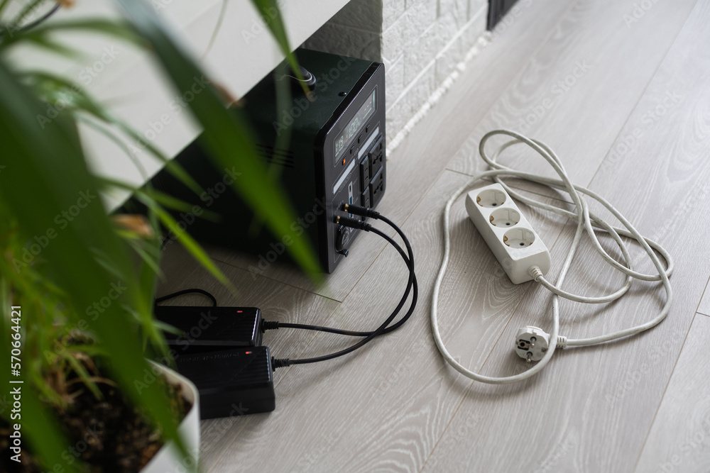 Charging station for gadgets when there is no light during blackout. Generator power bank battery in the absence of electricity. Charge electric rechargeable battery Charging station for gadgets when there is no light during blackout. Generator power bank battery in the absence of electricity. Charge electric rechargeable battery