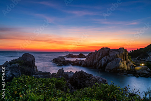 Aerial seascape of stone arch and sea at dusk, Ko Man Klang