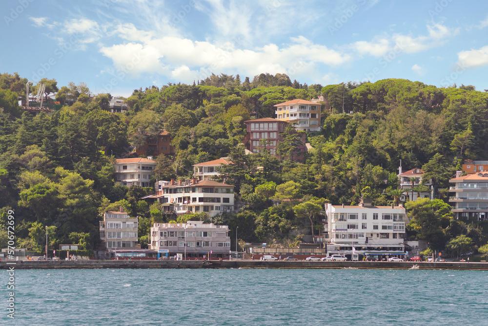 View from the sea of the European side of Bosphorus strait, Istanbul, Turkey, with traditional houses, in a summer day