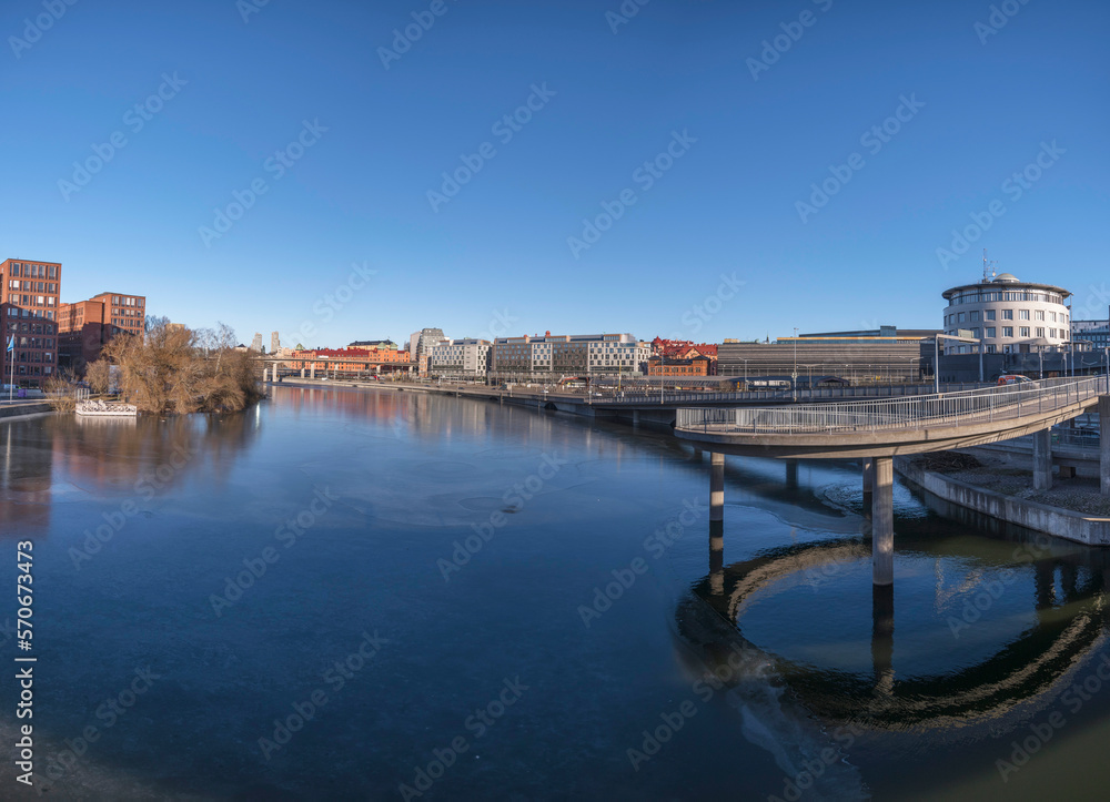 Bridges, hotels and office building at the canal Karlbergskanalen, a sunny winter day in Stockholm