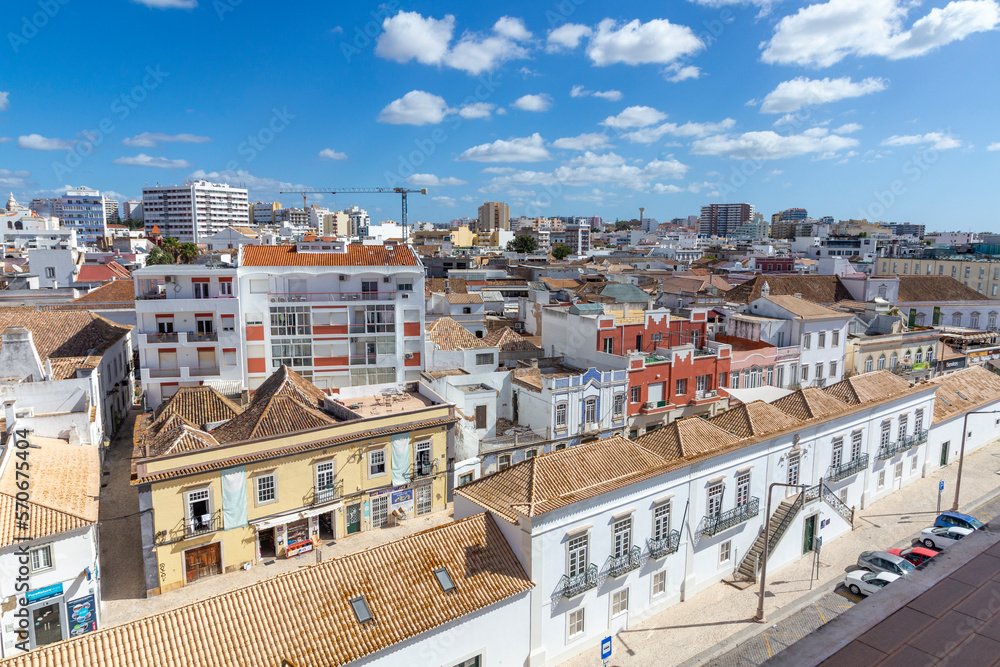 view to old town of Faro, Portugal, Algarve with mixture of modern and old traditional architecture.
