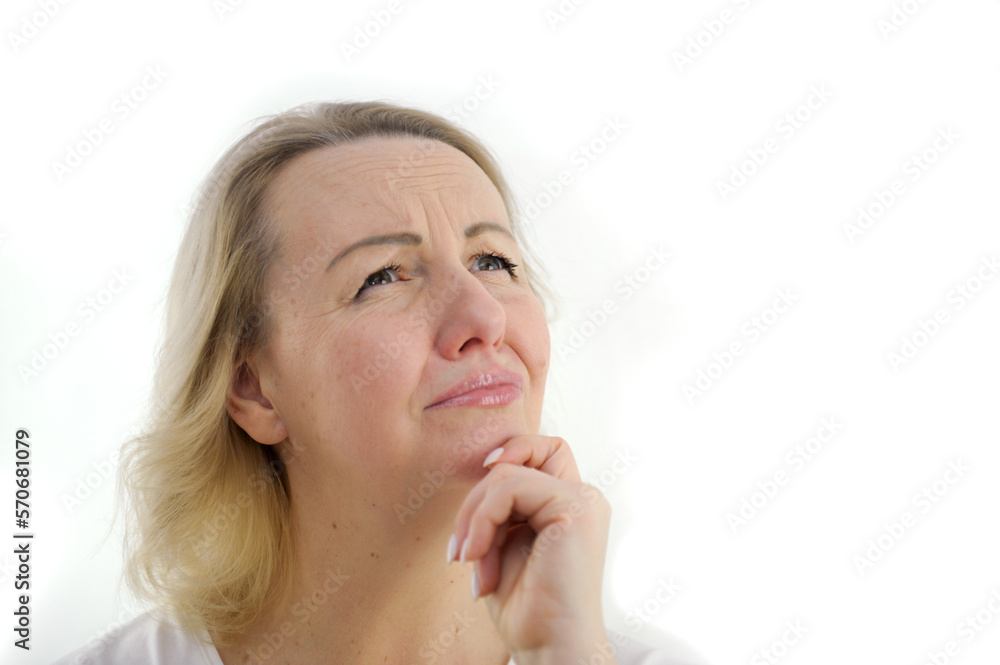 white background sad conceived woman raised her face eyes in top eyes lowered, will cry, tears, lips twisted, sad grimace hand near chin nuisance of waiting, frustration, sadness, unfulfilled dreams white background sad conceived woman raised her face eyes in top eyes lowered, will cry, tears, lips twisted, sad grimace hand near chin nuisance of waiting, frustration, sadness, unfulfilled dreams