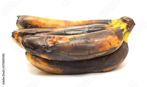 Картината върху платно a bunch of rotten bananas isolated on white background