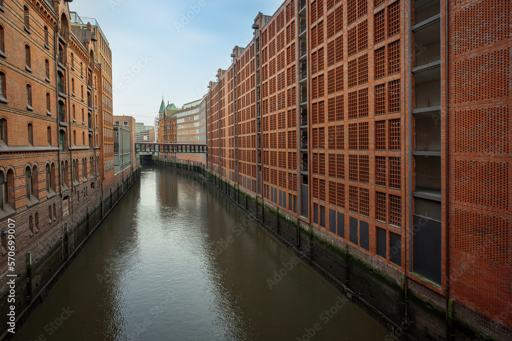 Brick Buildings and Canal at Speicherstadt warehouse district - Hamburg, Germany