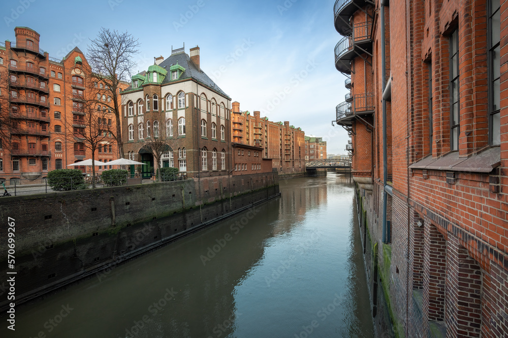 Canal at Speicherstadt warehouse district with Wasserschloss - Hamburg, Germany