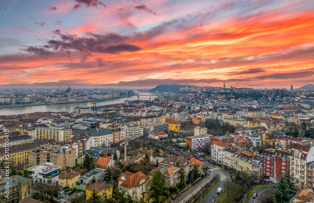 Aerial view of Budapest with Gellert hill, castle district, Parlament colorful dramatic sky