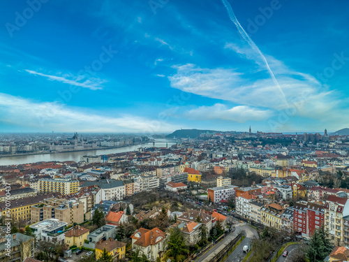 Aerial view of Budapest from the Rose Hill Rozsadomb with view of ORFI hospital , Gellert hill, Buda castle, Parliament the bridges over the danube