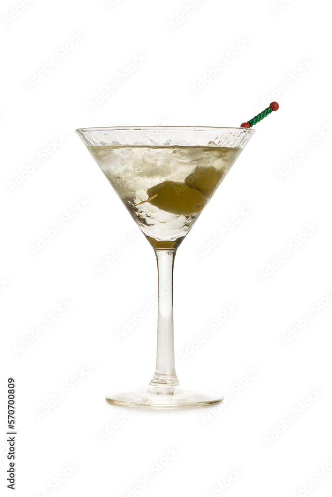 Cocktail glass with green olives inside