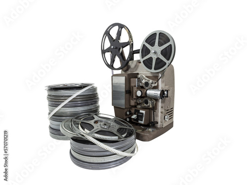 Vintage movie film reels and projector isolated with cut out background. photo