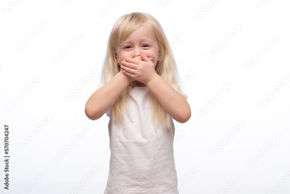 Little scared or crying or playing bo-peep girl hiding face. Isolated on white. Little scared or crying or playing bo-peep girl hiding face. Isolated on white.
