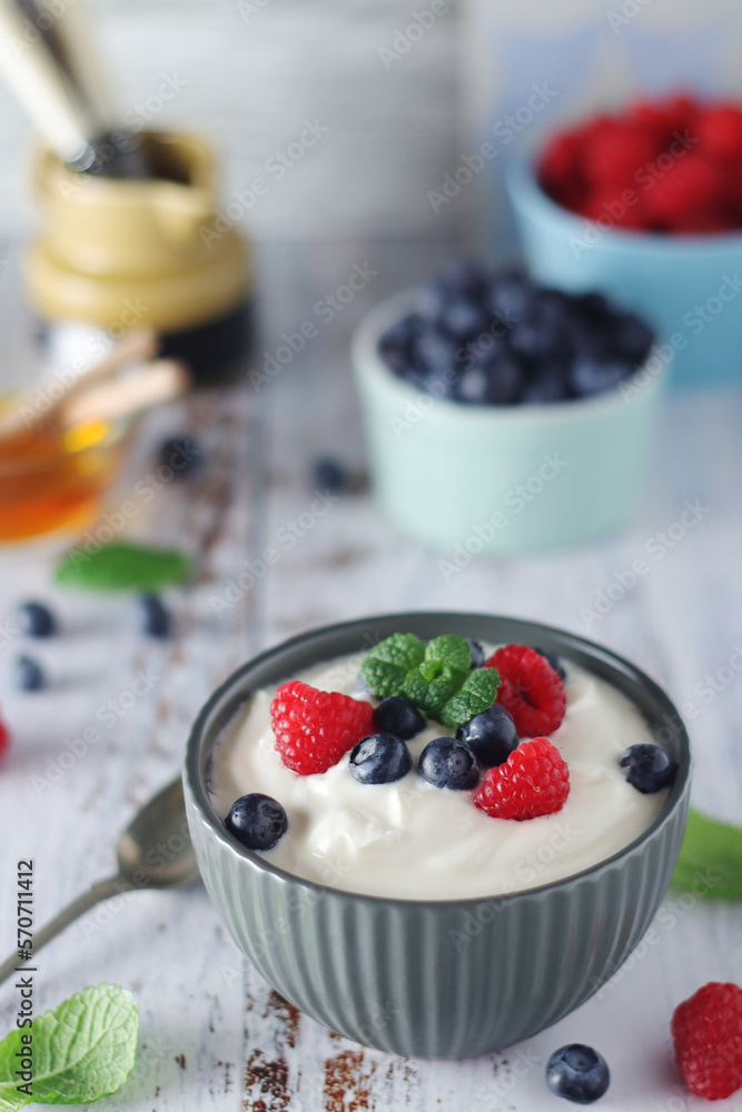A bowl with Greek yogurt with berries A bowl with Greek yogurt with berries
