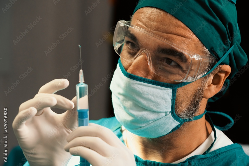 Surgeon fill syringe from medical vial for surgical procedure at
