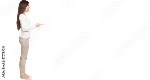 Full length side view of young woman pointing at copyspace isolated over white background Isolated cut out in transparent PNG file