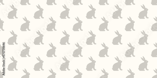 Hand drawn seamless pattern with cute doodle silhouette bunnies. Easter background. Perfect for textile or paper wrapping design. Vector illustration