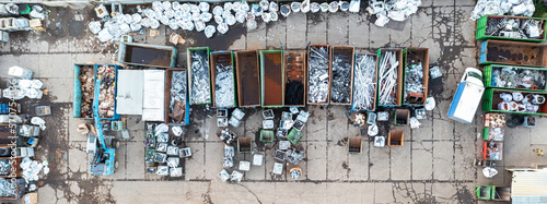 Containers from a height with different types of metal, Sorting for remelting metal products