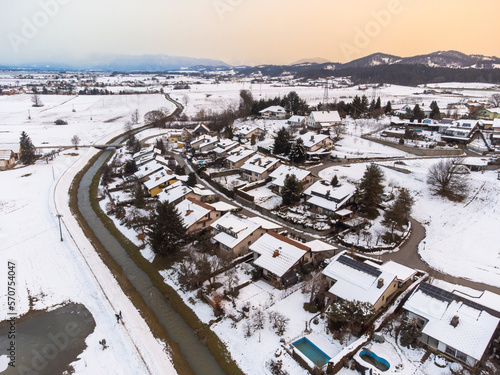 Snow covered residential street  aerial drone view