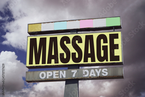 Aged and worn vintage massage sign