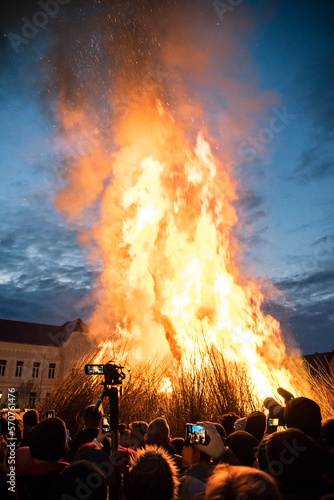 lighting a human-shaped bonfire in Mohács during the busójárás