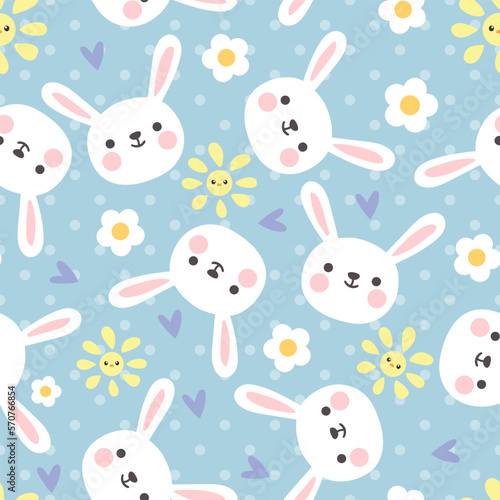 Happy white bunny with sun, flowers and hearts on a cute blue polka dot background. Kids vector seamless pattern.