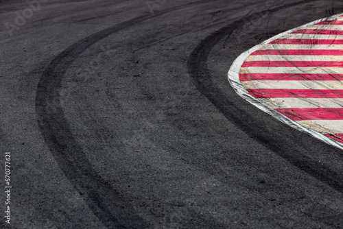 Abstract texture surface and background of car tire drift skid mark on road race track, Black tire mark on street race track, Automobile and automotive concept. © Kalyakan
