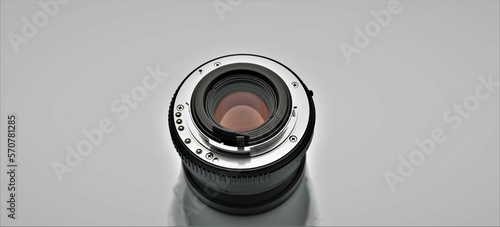 Camera lens on gray background 