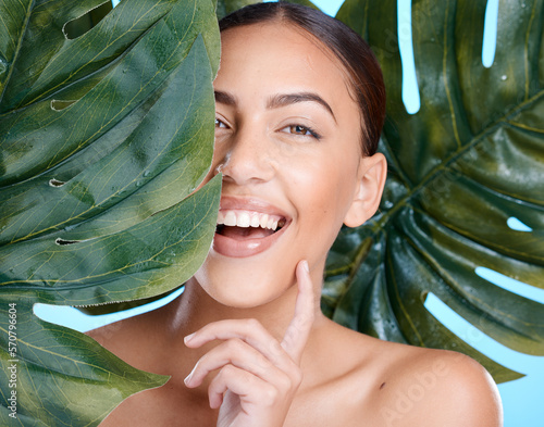 Beauty, plant leaf and portrait of woman face happy about natural dermatology, cosmetics and makeup. Person with spa green skincare product benefits for self care, skin glow and facial with a smile photo