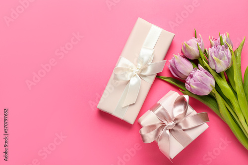 Gifts with tulips on pink background. Hello spring © Pixel-Shot