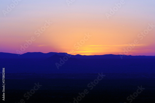 new mexico desert sunset with mountains foreground © Kevin Largent