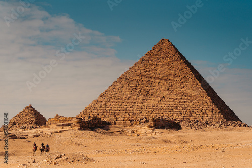 Riding Camels Near Pyramids, Giza Egypt