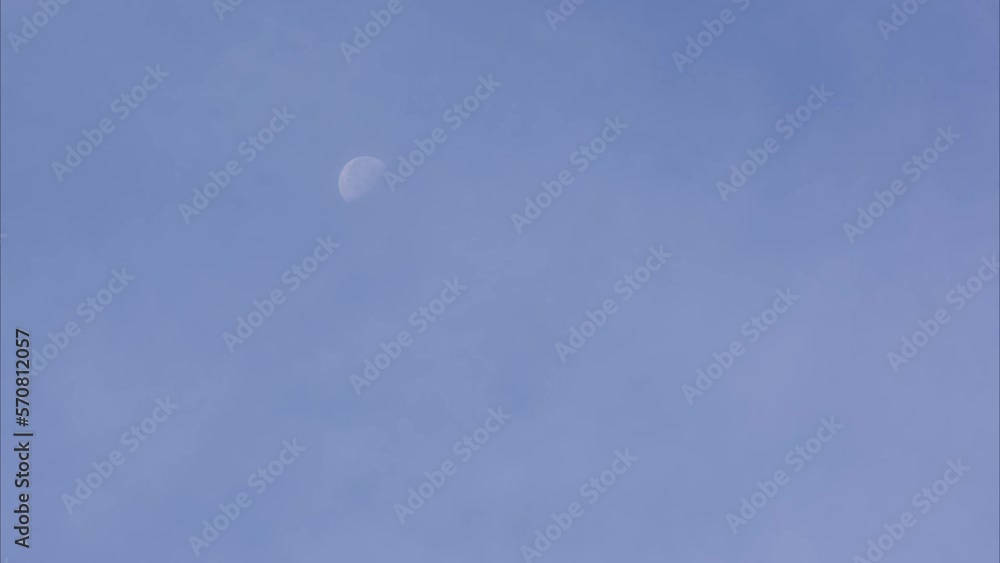 The process of the moon's descent in the beautiful clouds and sky The process of the moon's descent in the beautiful clouds and sky