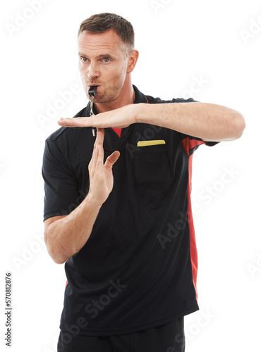 Sports, timeout and man referee in studio blowing a whistle for soccer match or training. Fitness, rules and mature male coach with hand football gesture or sign language isolated by white background photo