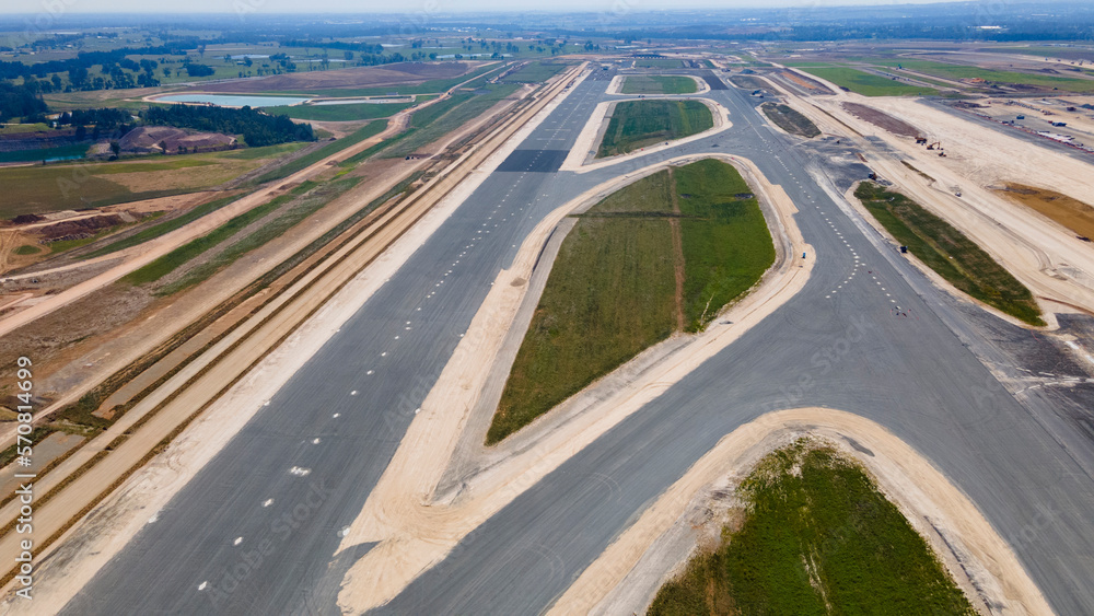 Aerial drone view of the runway at the construction site of the new International Airport at Badgerys Creek in Western Sydney, NSW, Australia in February 2023  