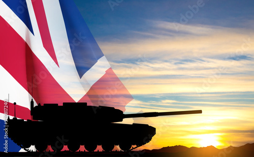 Silhouette of a battle tank on a battlefield against the sunset with United Kingdom flag. EPS10 vector