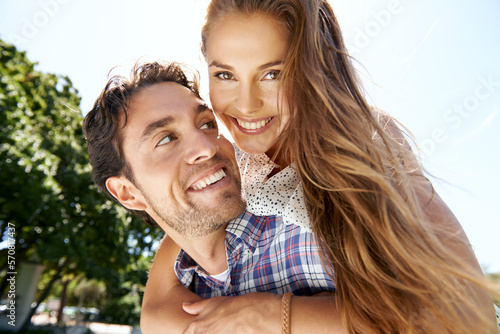 Happy couple, portrait or piggyback on love, valentines day or romance date in park bonding, garden backyard or nature. Face, smile or man carrying woman in fun game, freedom trust or energy support