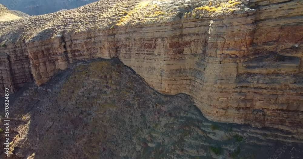Drone flyby over a mountain gorge on a summer day Drone flyby over a mountain gorge on a summer day