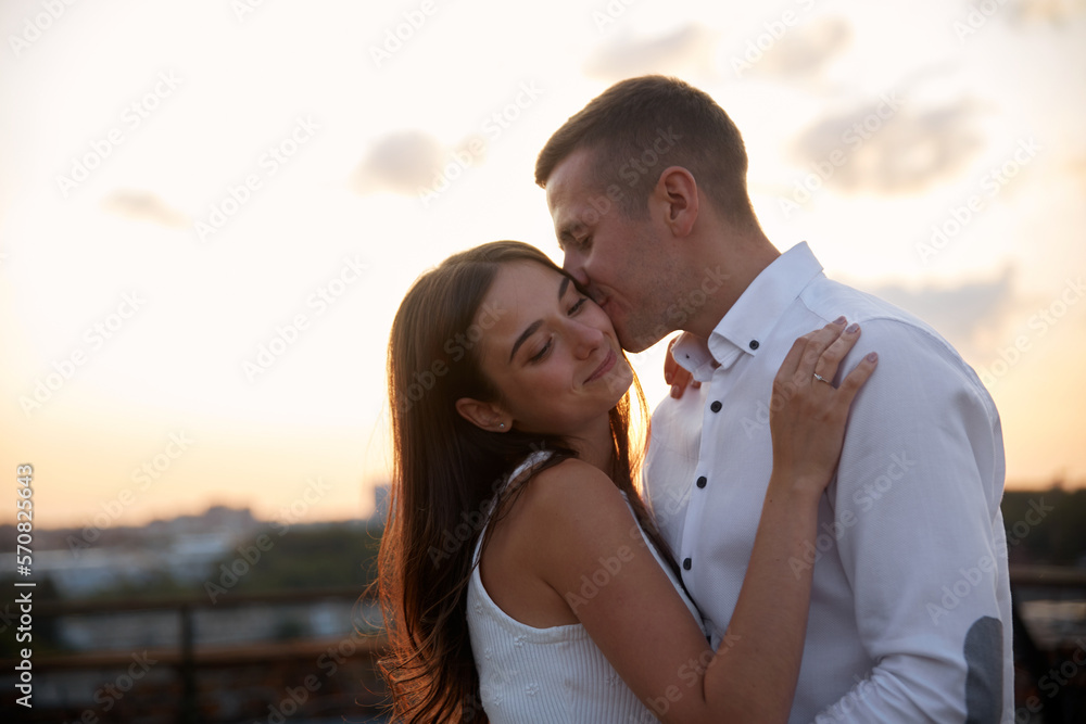 Fototapeta premium Young couple in love hug each other