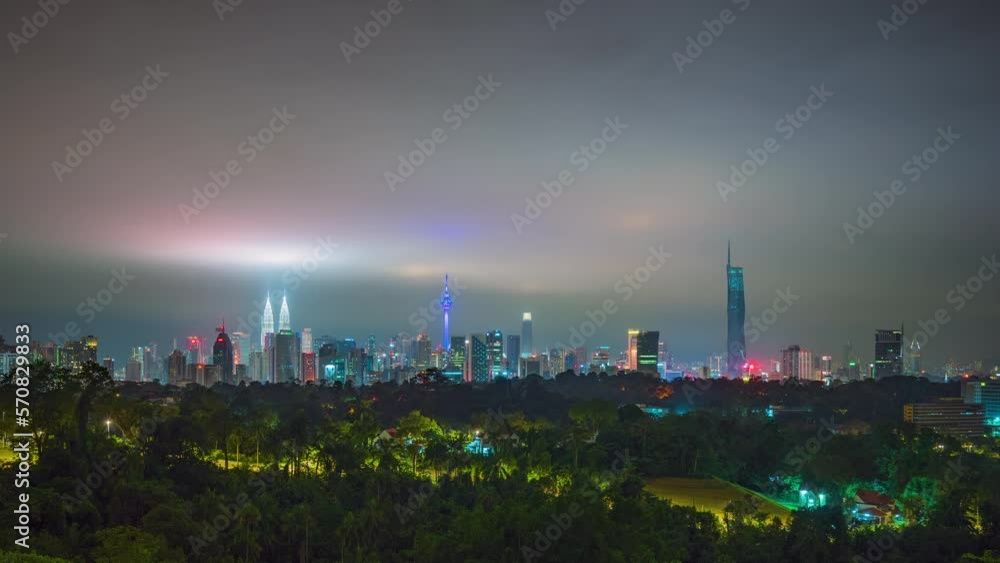 onsoon Time lapse of Kuala Lumpur cityscape during the night time with clouds marching in onsoon Time lapse of Kuala Lumpur cityscape during the night time with clouds marching in