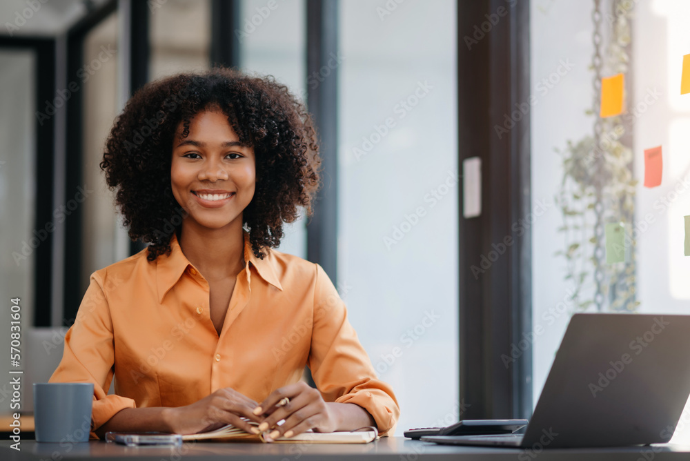 Asian woman feeling migraine head strain.Overworked businesswoman financier while working on laptop and tablet at office.. Asian woman feeling migraine head strain.Overworked businesswoman financier while working on laptop and tablet at office..
