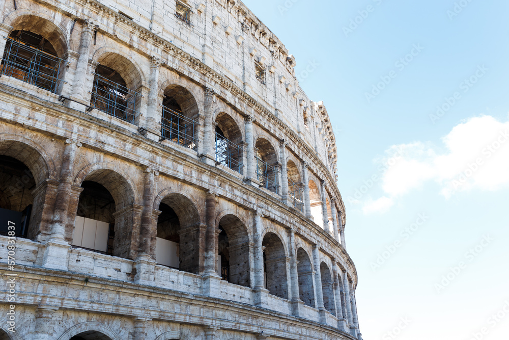 The Colosseum on the reconstruction is illuminated by the summer sun