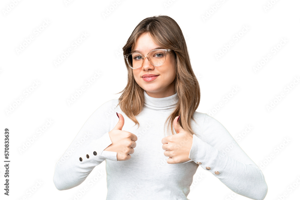 Young girl over isolated chroma key background With glasses and with thumb up Young girl over isolated chroma key background With glasses and with thumb up