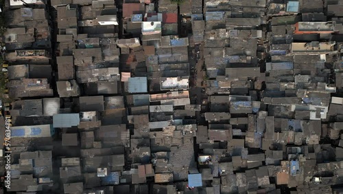 Top down aerial view of Dharavi slums in Mumbai, Maharashtra, India. Dharavi is considered to be one of the largest slums in the world and the largest in Asia.	
