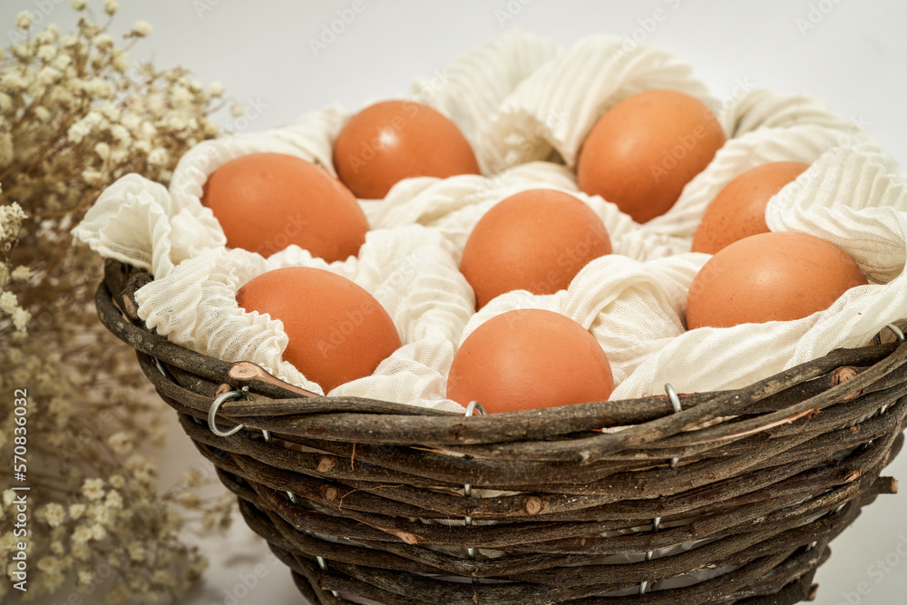 eggs in a wicker basket with a mint cloth